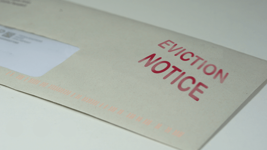 Envelope with Eviction Notice in red text, representing a formal eviction warning document.